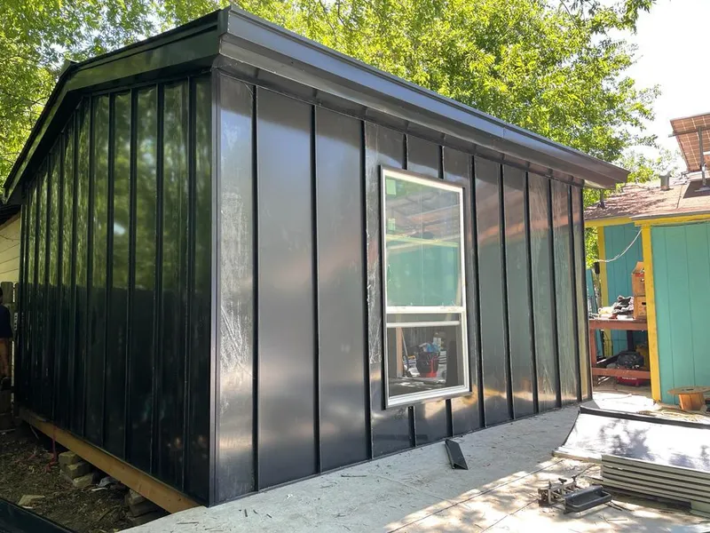 Black standing seam metal wall panels for Roof Inspection in Indianapolis