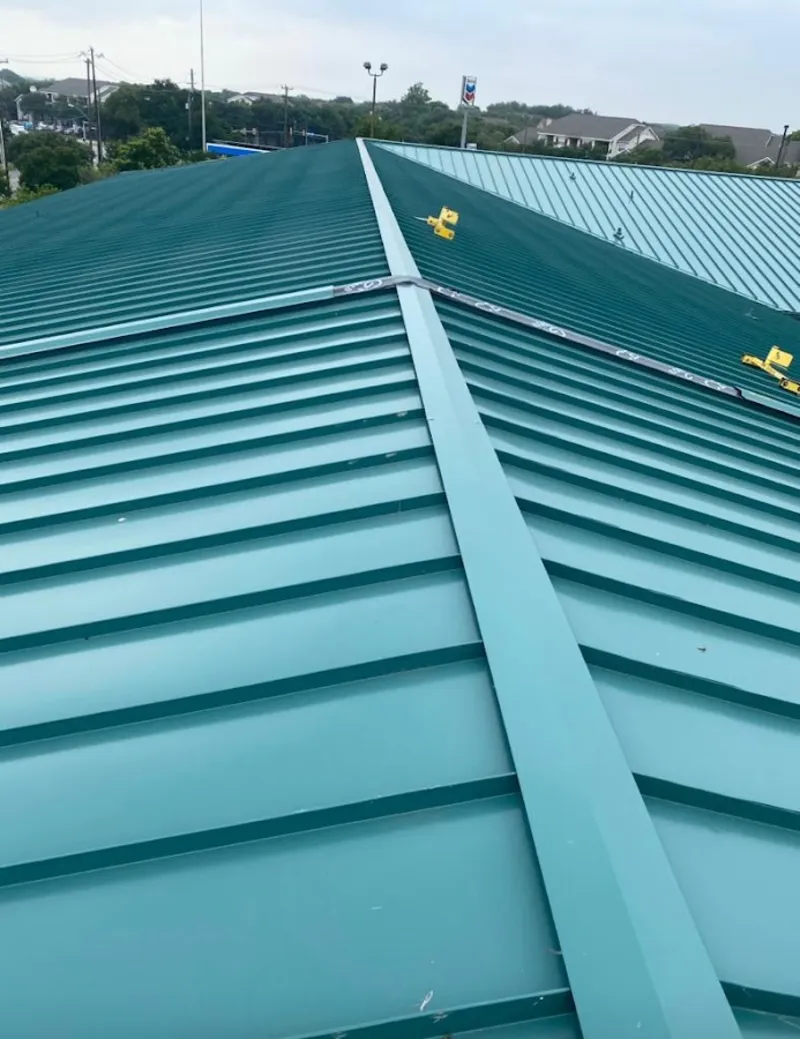 Green commercial metal roof ridge and valley for Metal Roof Repair in Indianapolis
