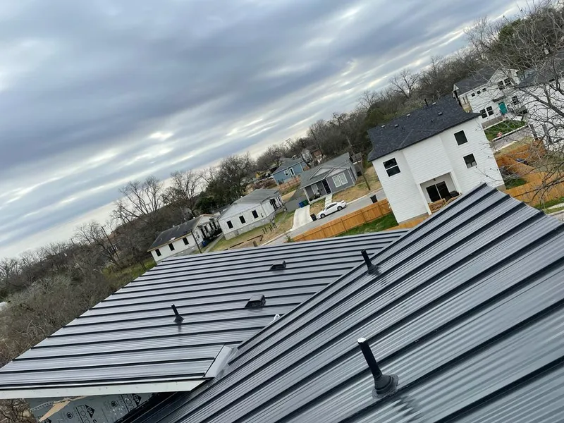 Standing seam metal roof panels with vents for Skylight Repair in Indianapolis